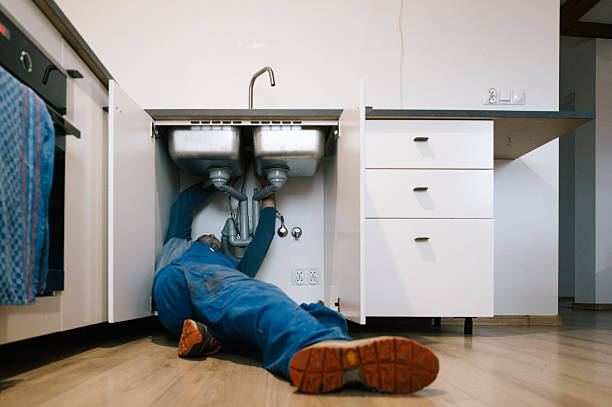 Professional Plumbing technician working in Romance, AR